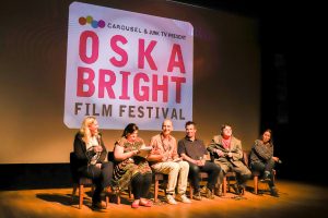 Panel on stage at Oska Bright Film Festival