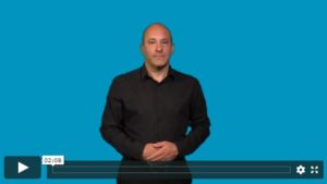Still from video of a BSL interpreter with a blue background