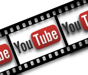 Graphic of film strip with YouTube logo