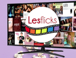 A TV with the Lesflix logo in the middle of the screen surrounded by film posters of various LGBTQ titles. There is popcorn strewn around it.