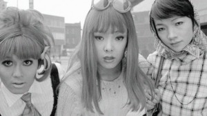Still from Funeral Parade of Roses. Black and white image of three women leaning towards the camera.